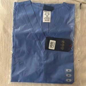 Light purple Cherokee scrub top. XS. Never worn with tags